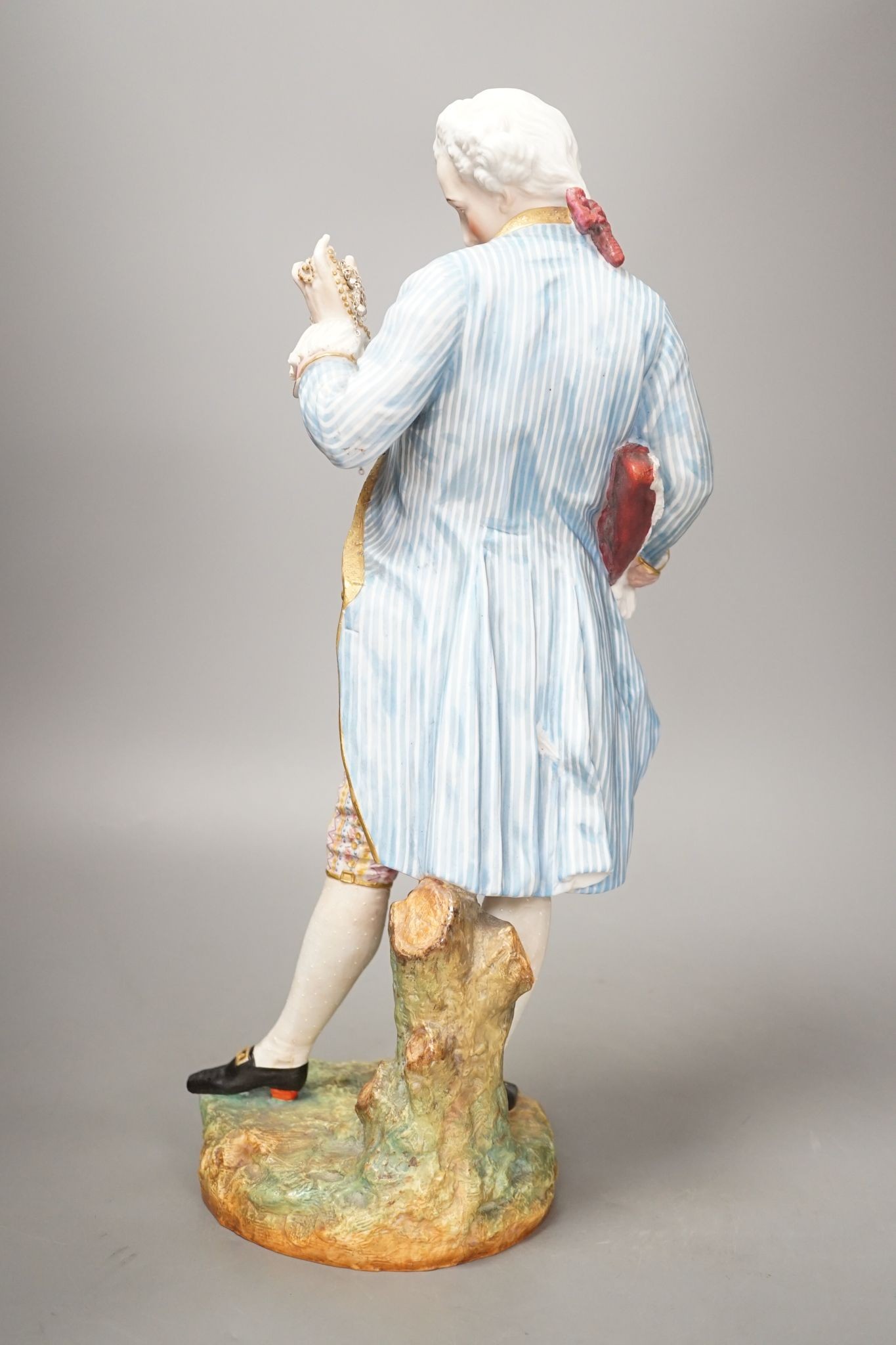 A large French coloured biscuit figure of a gentleman 42cm